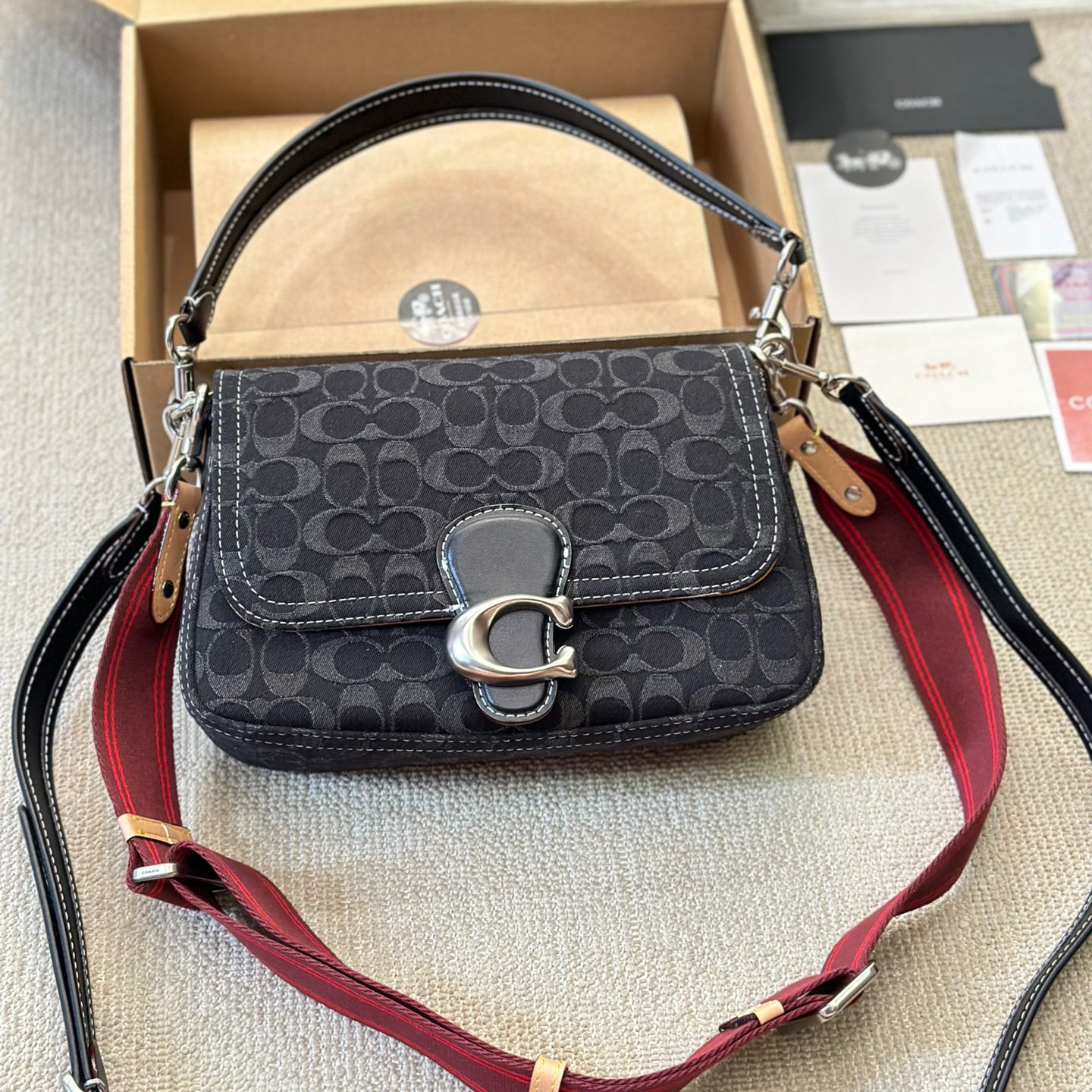 Coach-Embossed denim denim bag