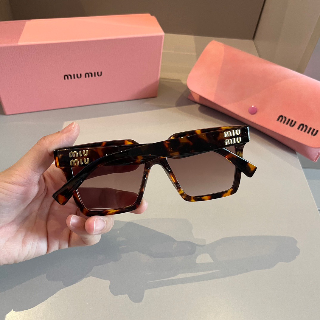 MIUMIU-New black gold Sunglasses