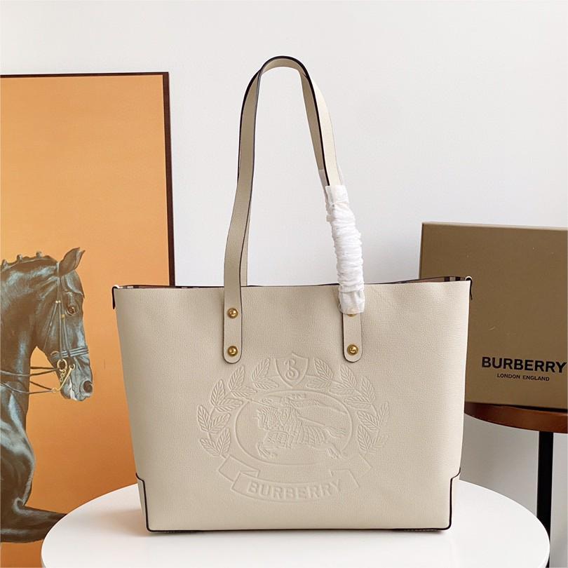 Burberry-Embossed badge leather tote bag