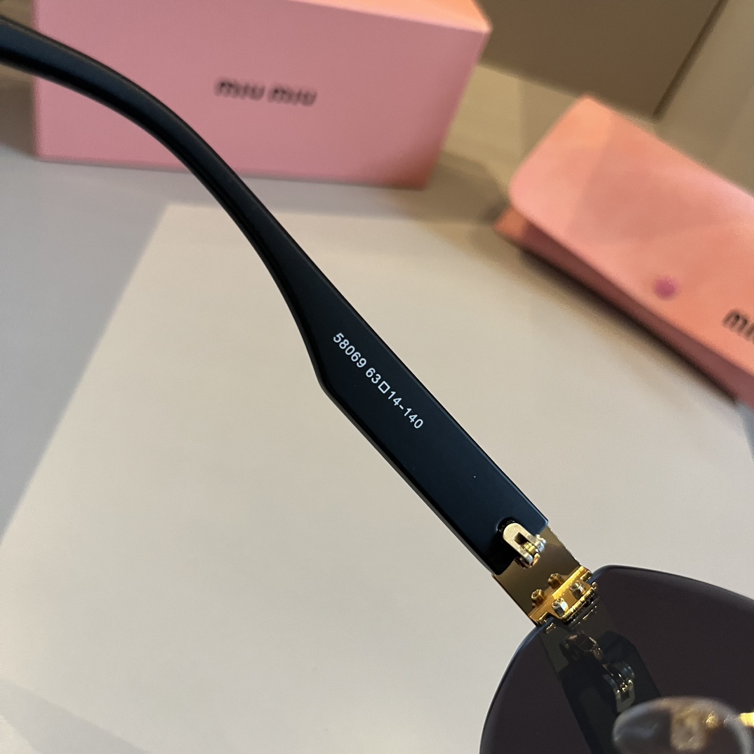 MiuMiu- New frameless Sunglasses