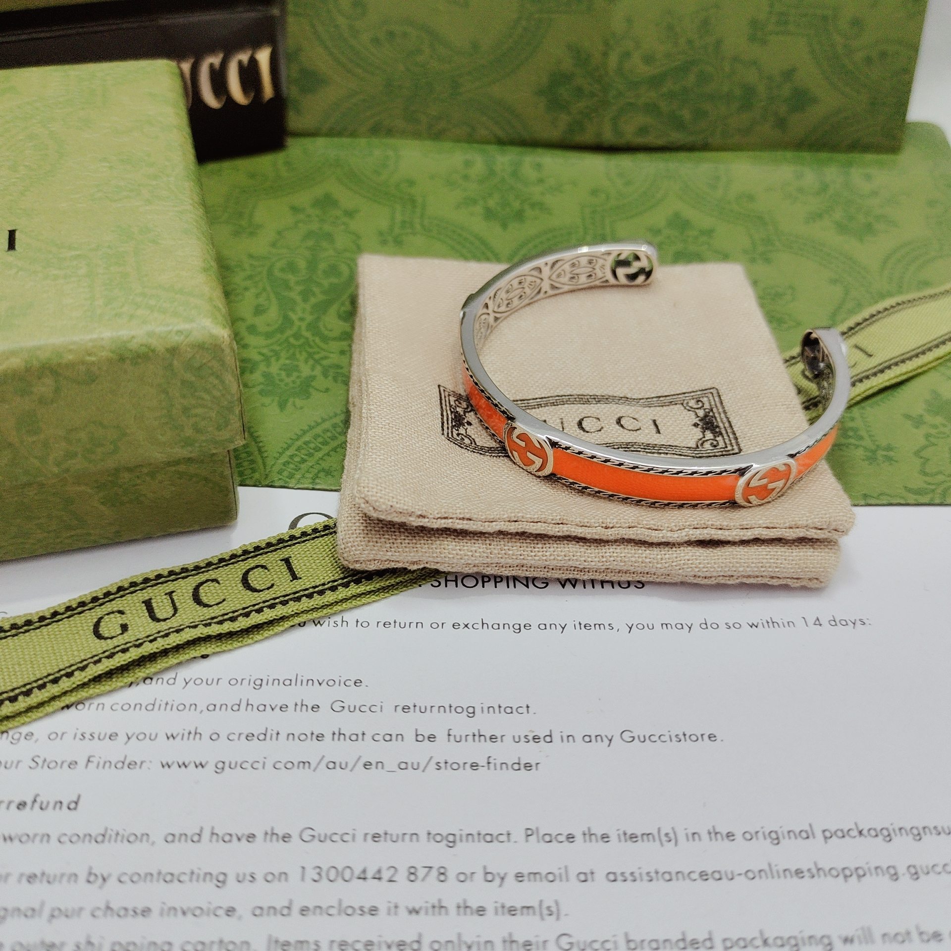 GUCCI-Orange enamel and woven rolled edge bracelet