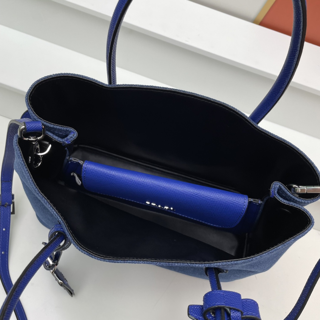 Prada-Cowboy top layer cross pattern cowhide used bag