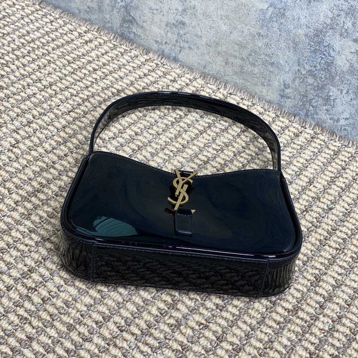 YSL-Lacquer leather armpit bag