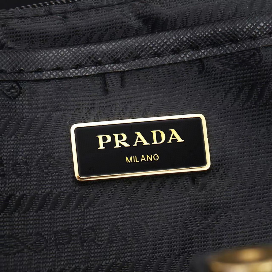 Prada-Golden buckle classic backpack