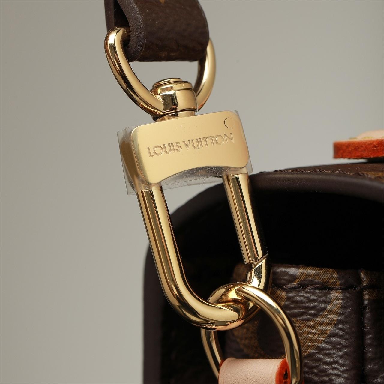 LV-Pochette Métis East West