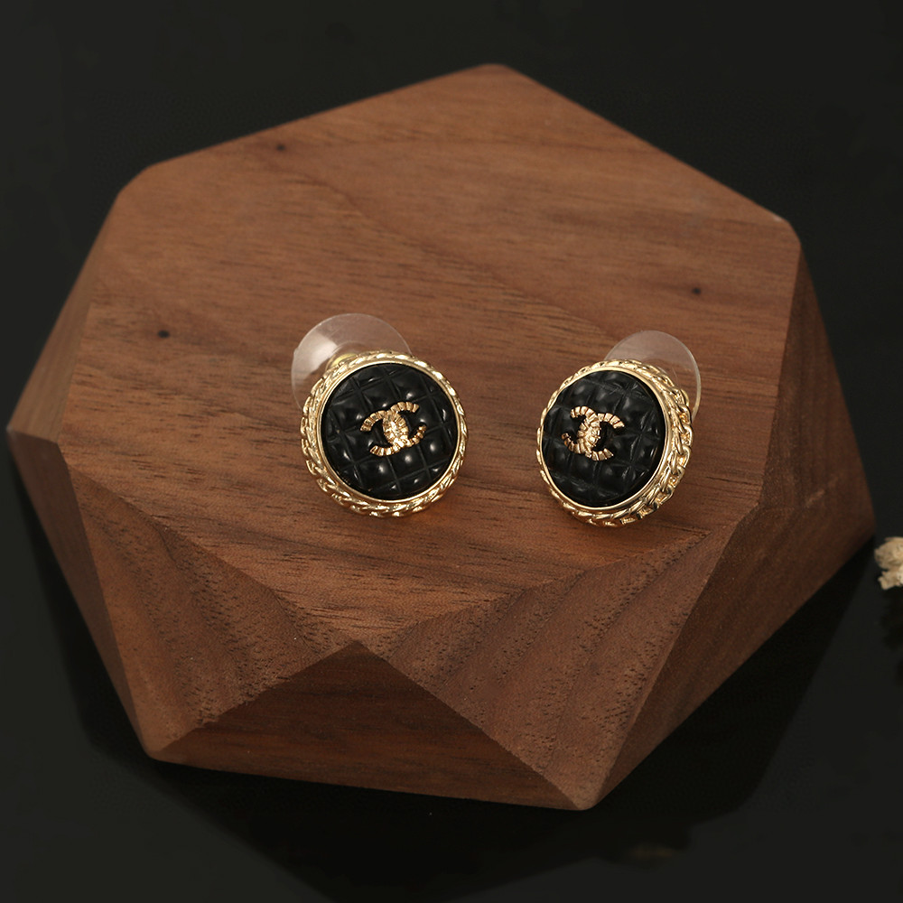 Chanel-Round black lava enamel earrings