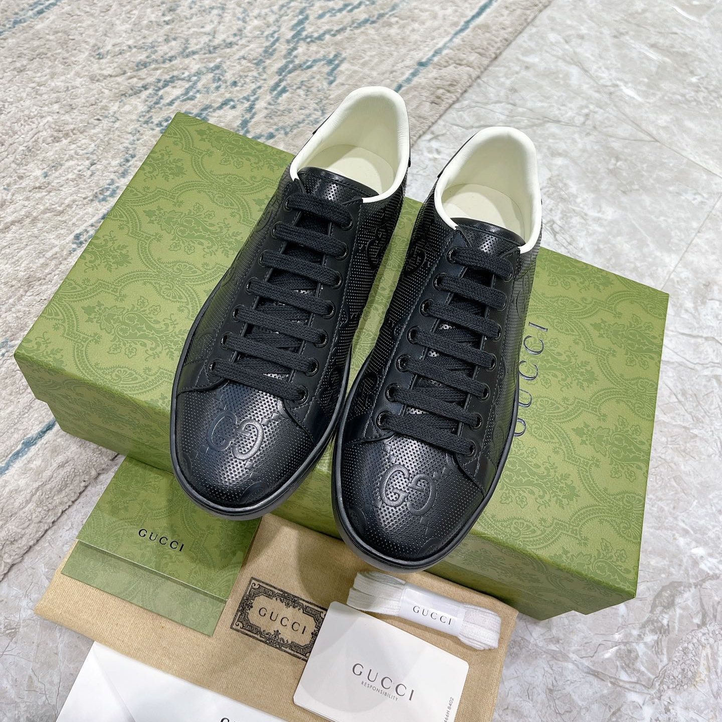 GUCCI - ACE GG Embossed Print Sneakers