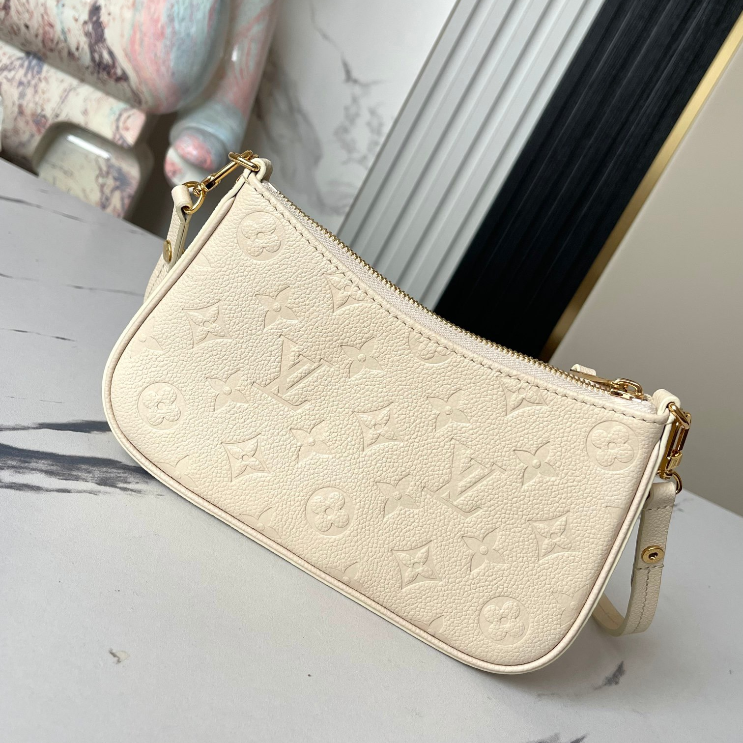 LV - Easy Pouch On Strap Monogram Embossed Leather Shoulder Bag