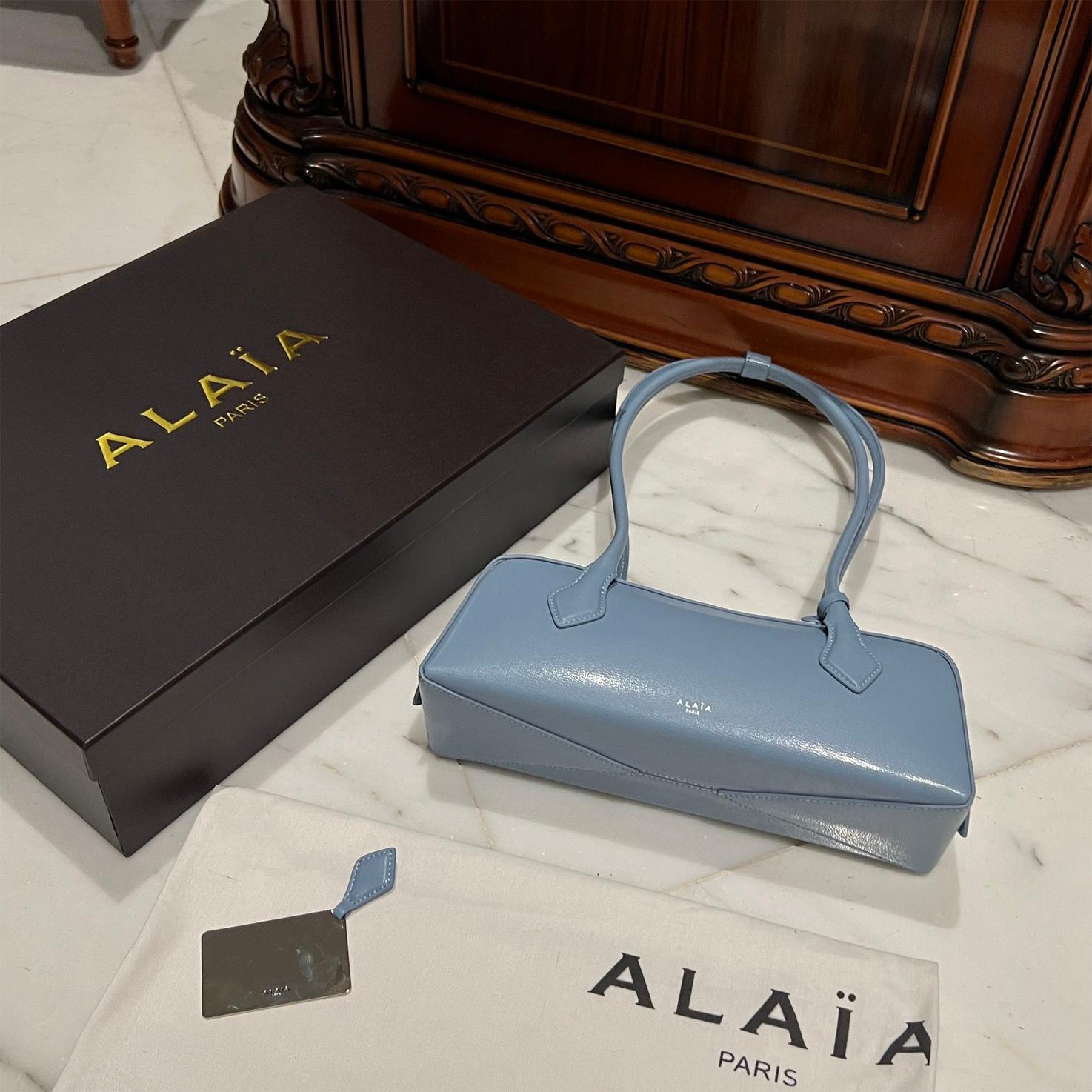 LIAIA-LE TECKEL SMALL BAG IN GOATSKIN Light blue