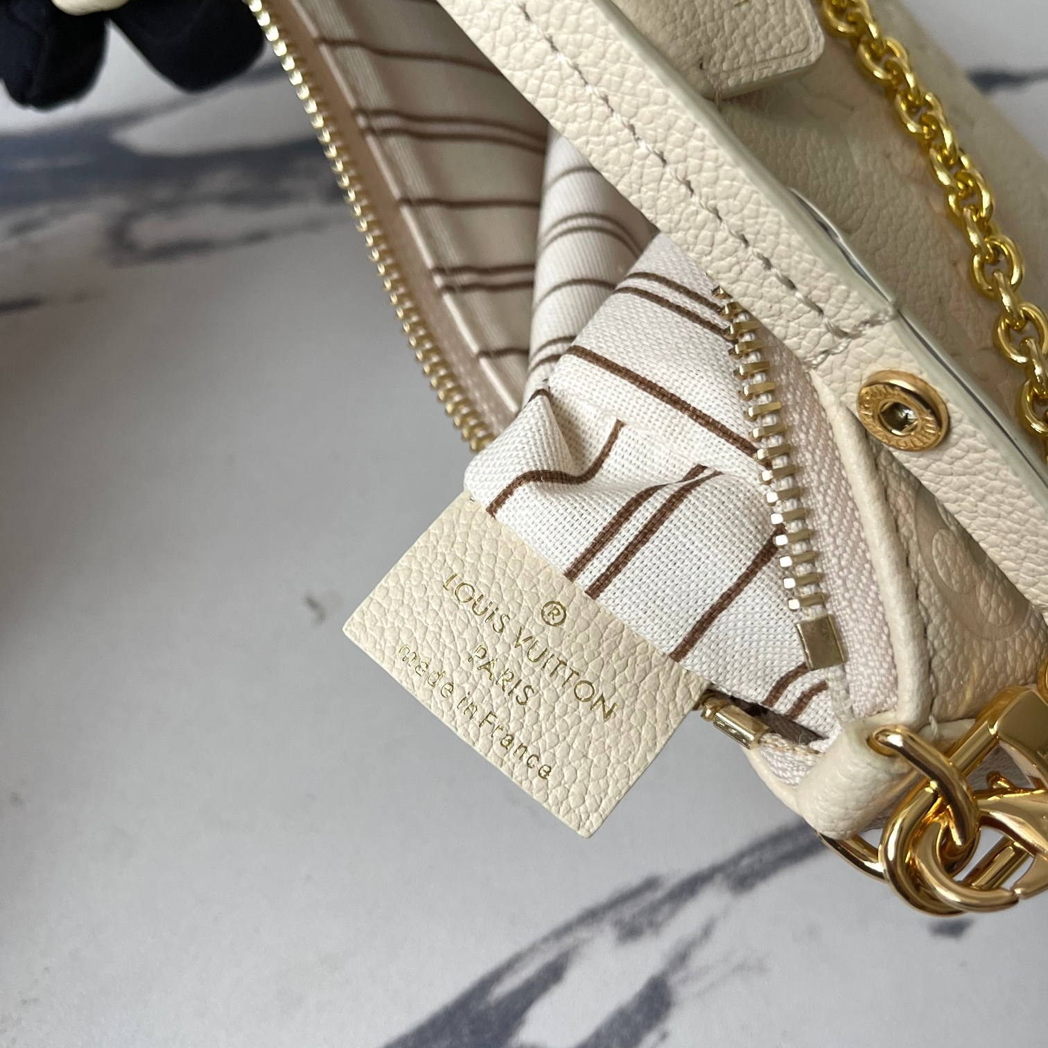 LV - Easy Pouch On Strap Monogram Embossed Leather Shoulder Bag