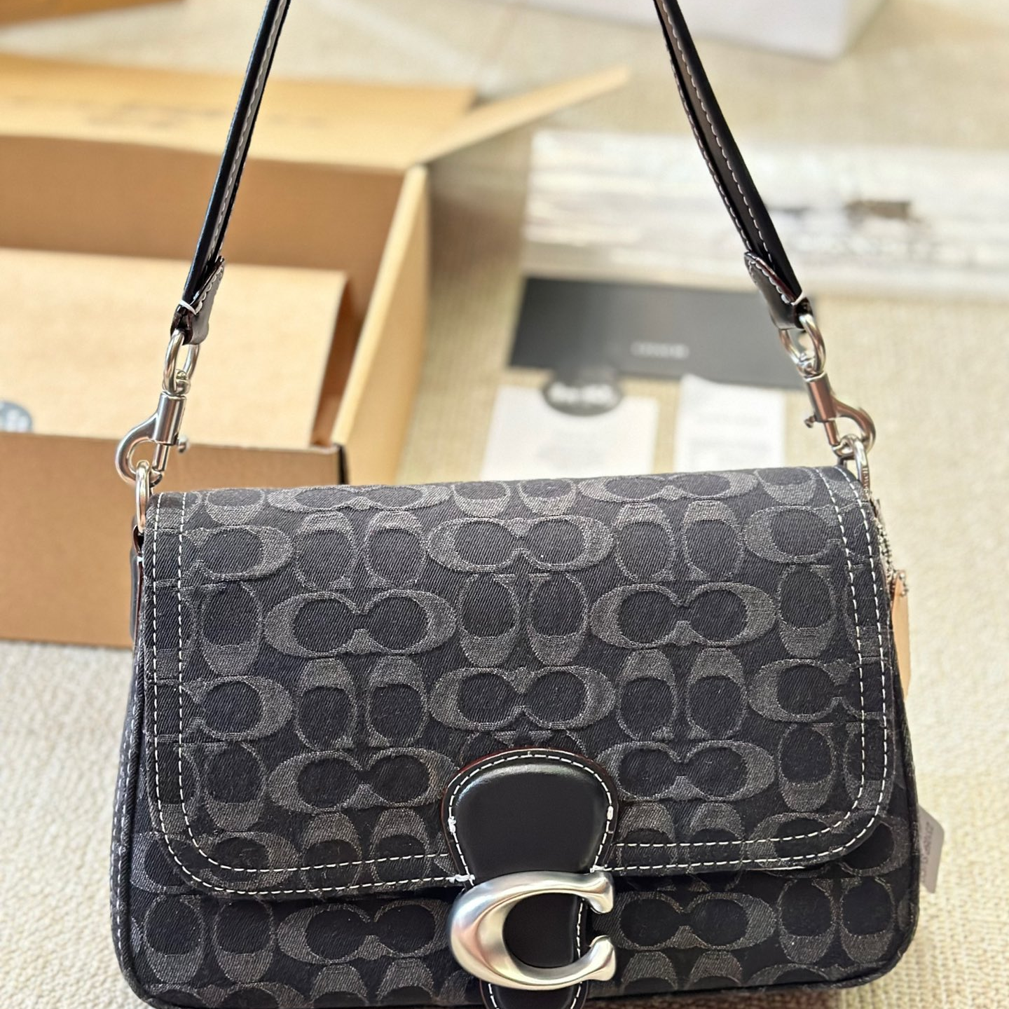 Coach-Embossed denim denim bag