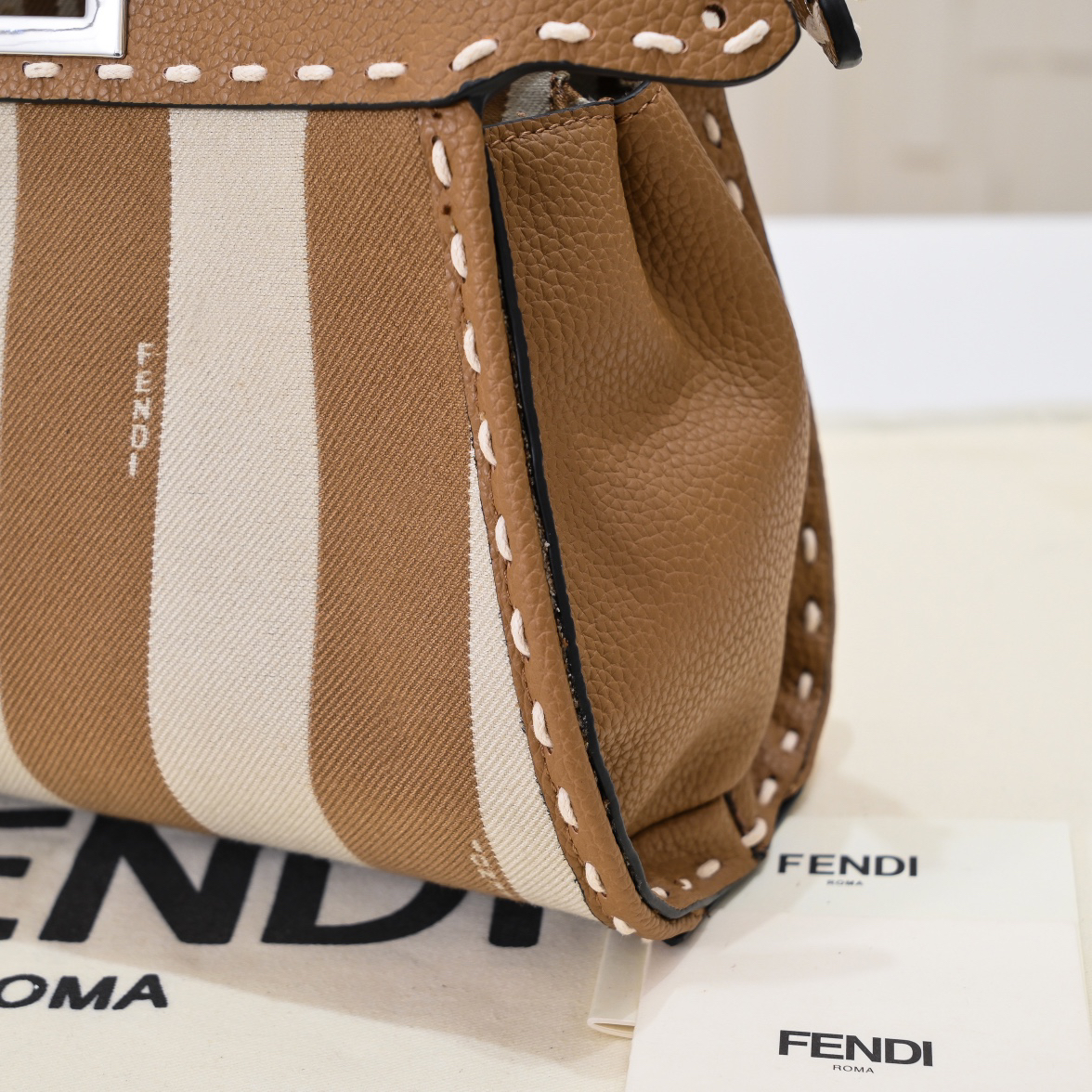 FENDI-Latest striped hand sewn kitten bag