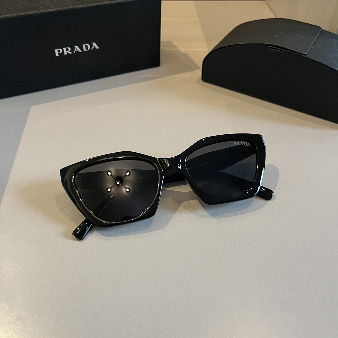 Prada-Angular cat eye Sunglasses