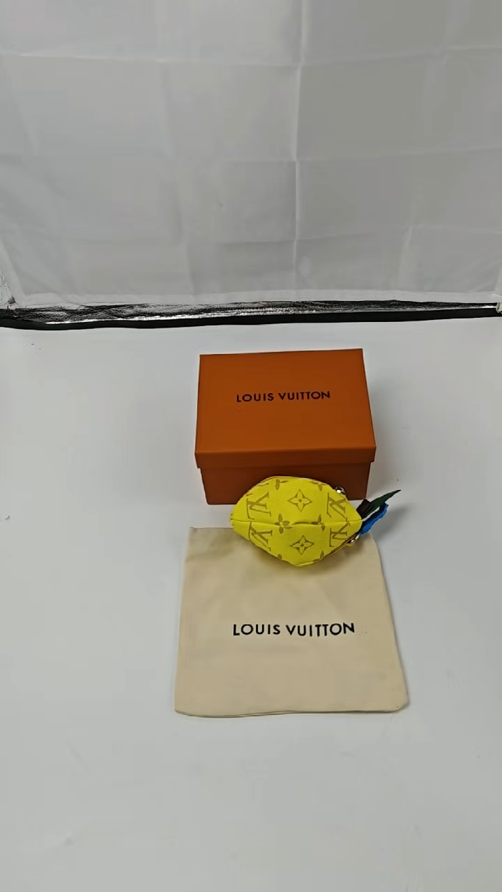 LOUIS VUITTON - Classic monogram Lemon shape canvas and cowhide leather Clutch