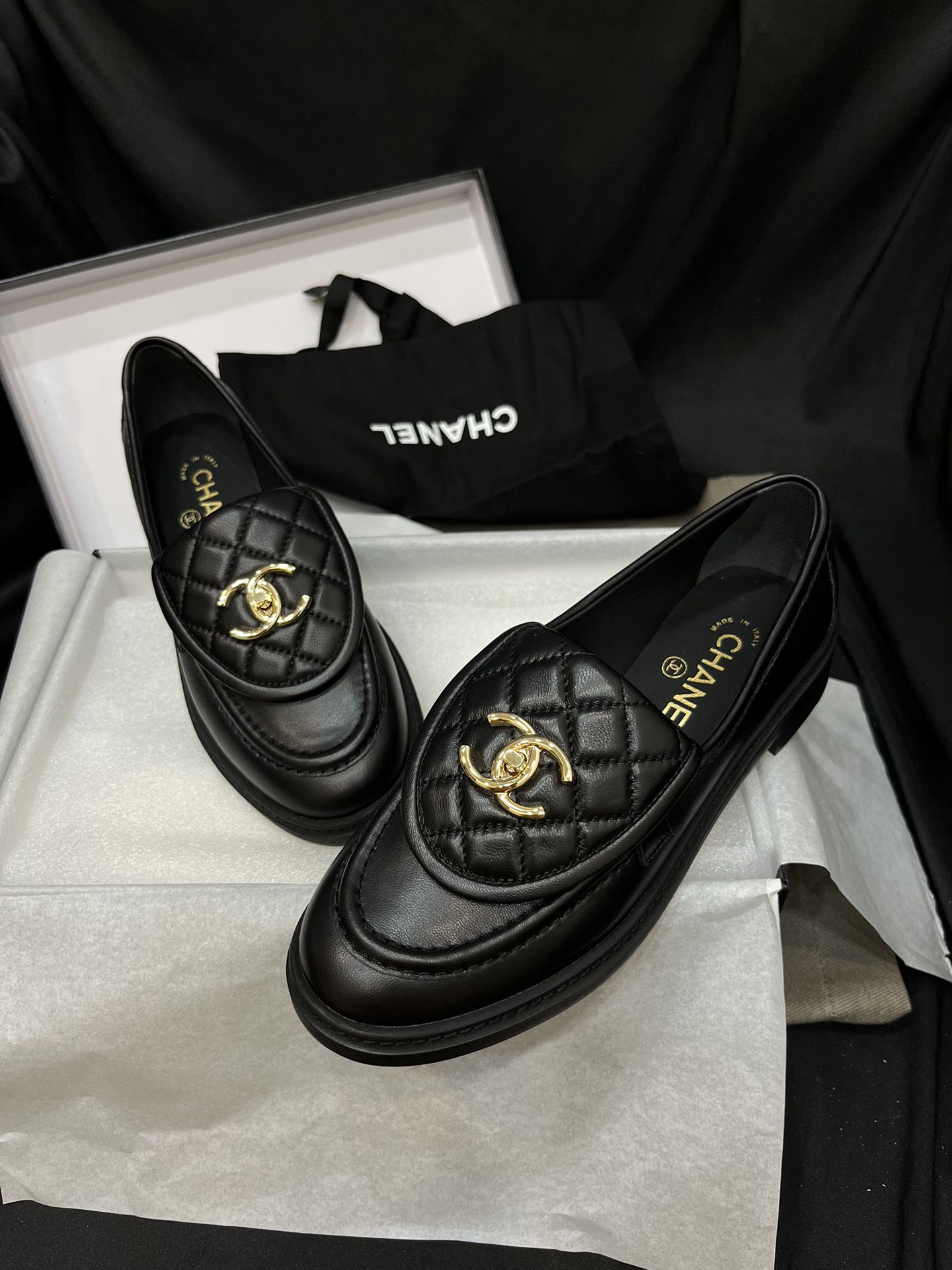 Chanel - Black Quilted Loafers with Gold Logo