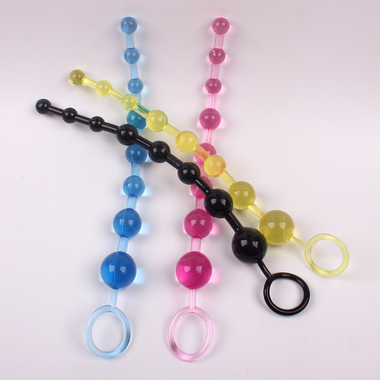 Crystal anal plug with rotating beads, suitable for both men and women. Provides G-spot stimulation, expansion, and massage.