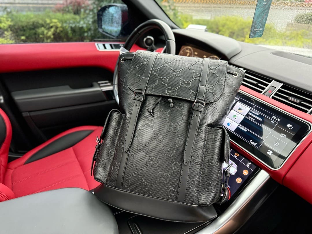 Gucci GG Leather Logo Embossed Backpack