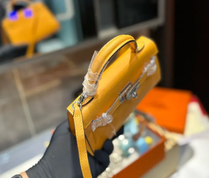 HERMÈS VERSO JAUNE AMBRE TYRIEN CHÉVRE MINI KELLY 20 II PHW