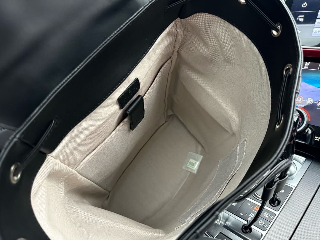 Gucci GG Leather Logo Embossed Backpack