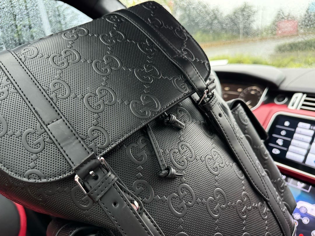 Gucci GG Leather Logo Embossed Backpack
