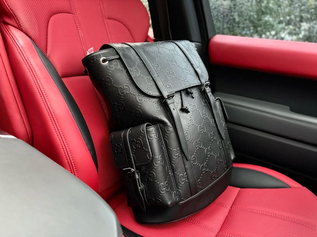 Gucci GG Leather Logo Embossed Backpack