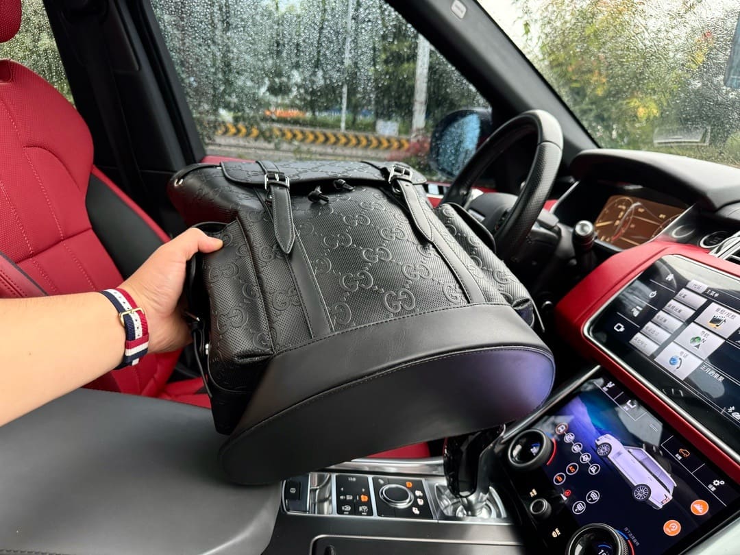 Gucci GG Leather Logo Embossed Backpack