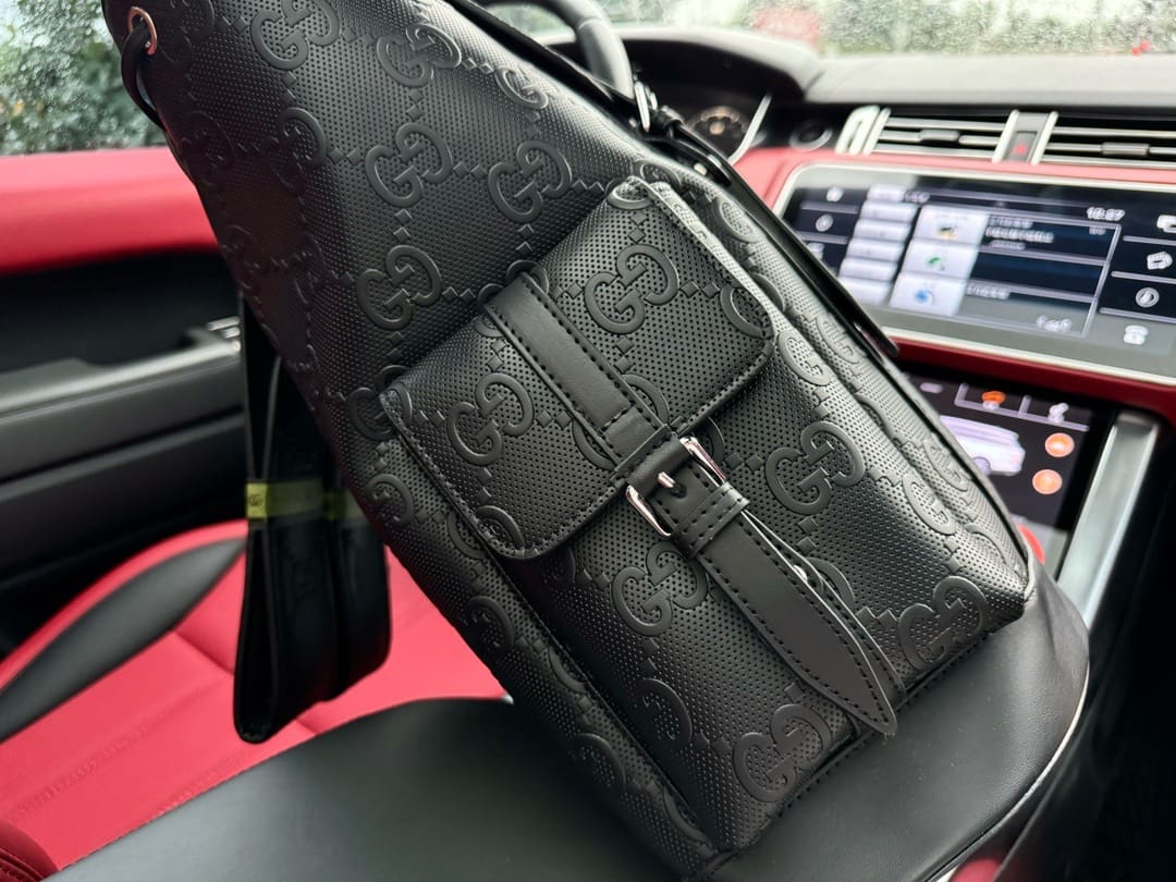 Gucci GG Leather Logo Embossed Backpack