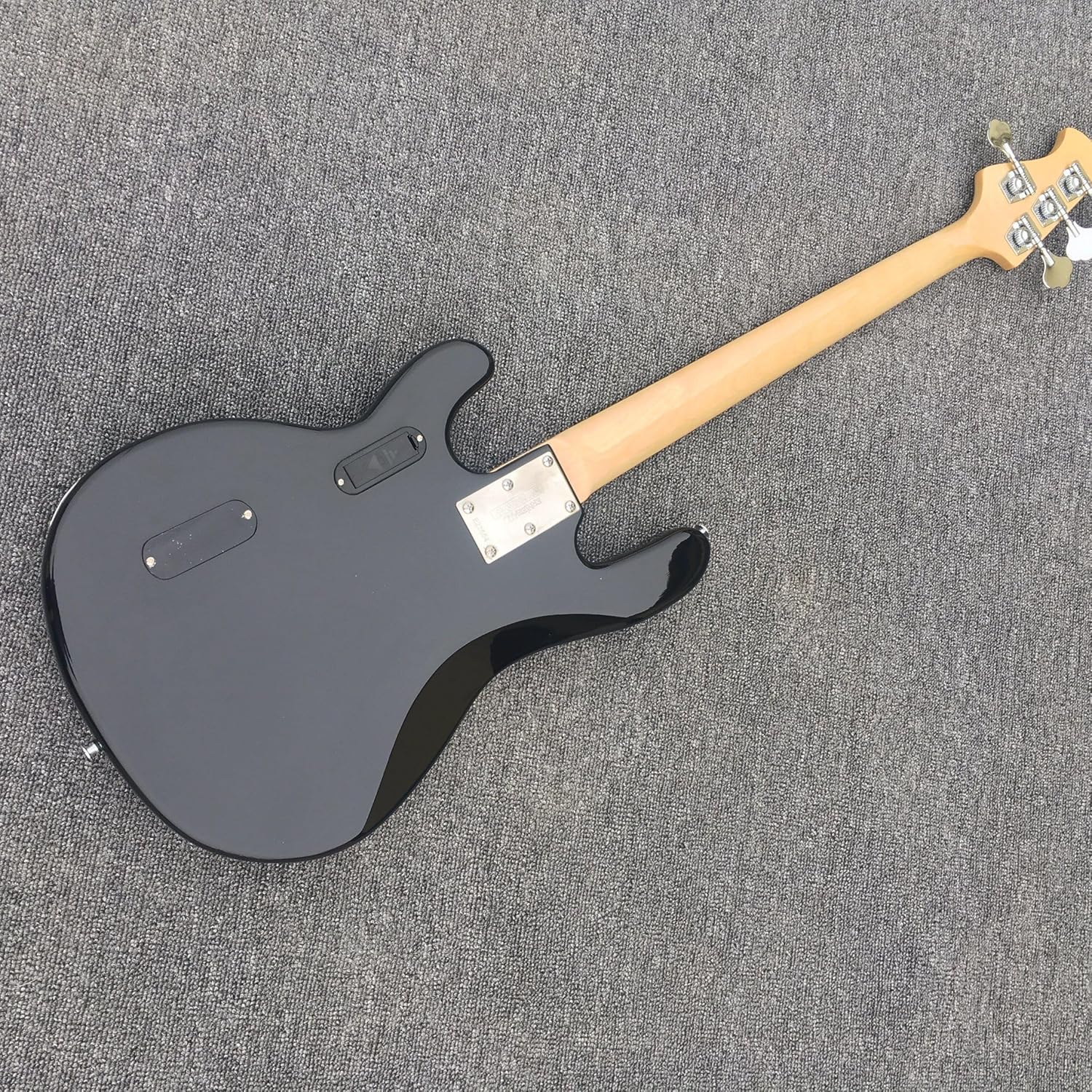 Custom Four-Wire Black Electric Bass with Enlarged Line - Perfect for Bassists Seeking a and High- Instrument for Personalized Performance