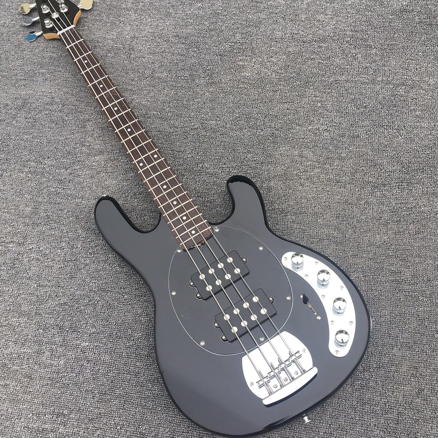 Custom Four-Wire Black Electric Bass with Enlarged Line - Perfect for Bassists Seeking a and High- Instrument for Personalized Performance