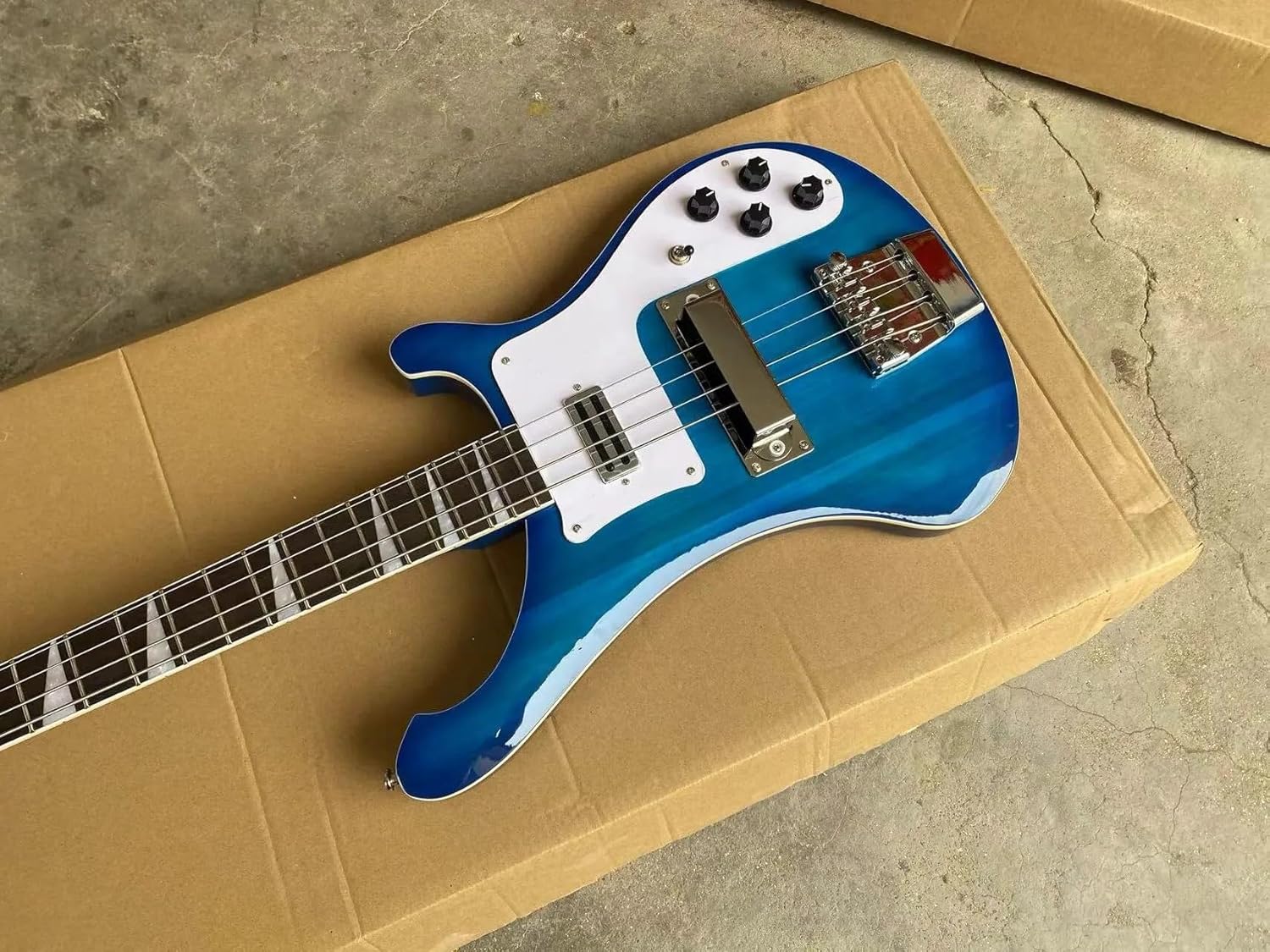 4-String Electric Bass Guitar - Vibrant Blue Gloss Finish, White Pickguard - Rosewood Fretboard, Basswood Body