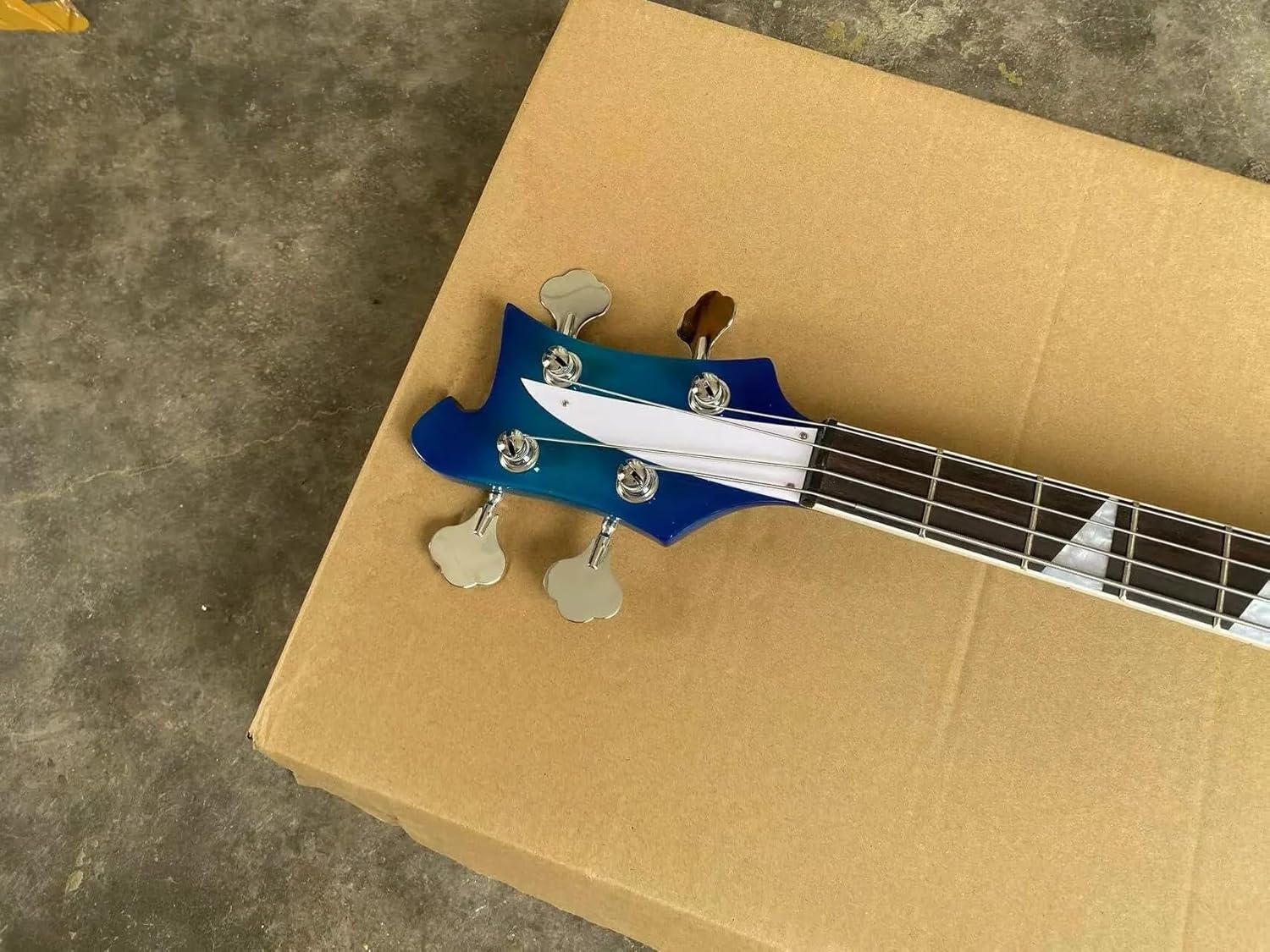 4-String Electric Bass Guitar - Vibrant Blue Gloss Finish, White Pickguard - Rosewood Fretboard, Basswood Body