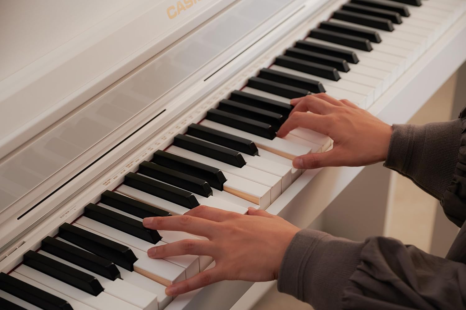 Casio AP-550 CELVIANO 88-Key Digital Piano - White Bundle with Adjustable Bench, Headphones, Piano Book, Online Lessons, Austin Bazaar Instructional DVD, and Polishing Cloth