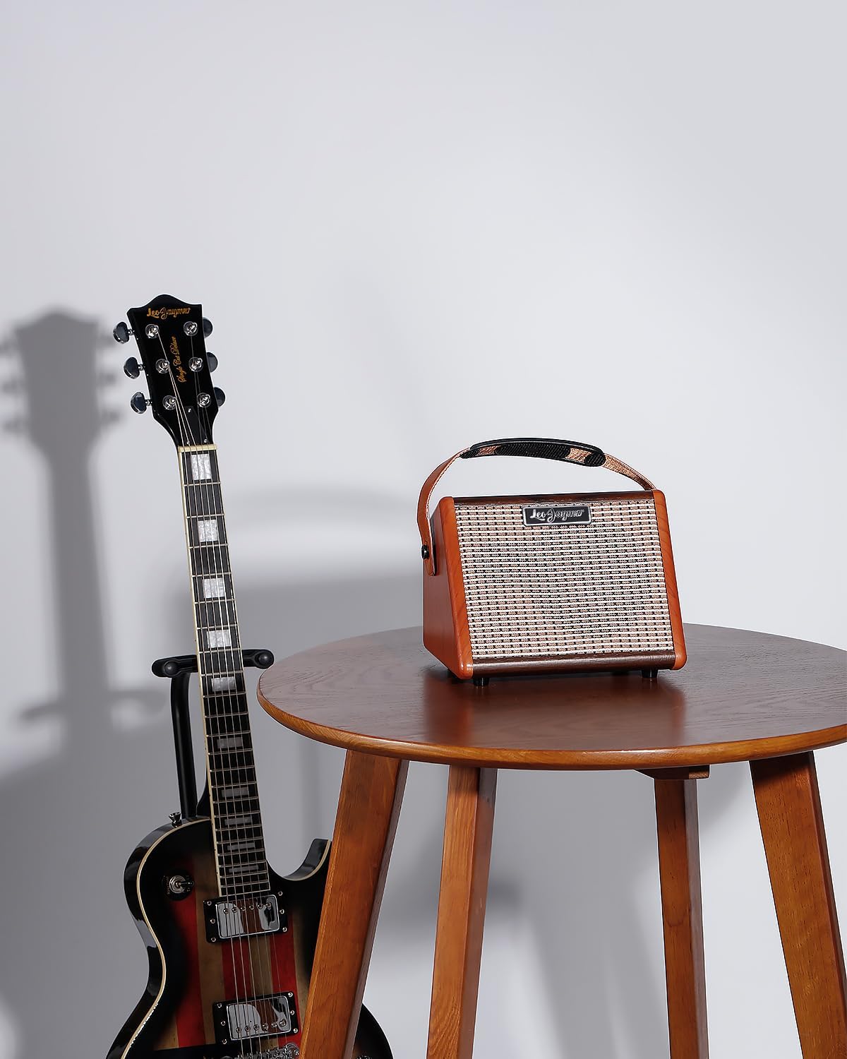 Leo Jaymz 15W Portable Electric Guitar Amp with BT, Rechargeable Battery, Built-in Effects Reverb, Overdrive, EQ, Woodgrain Finish, and 6.35mm Headphone Jack (AG-15)