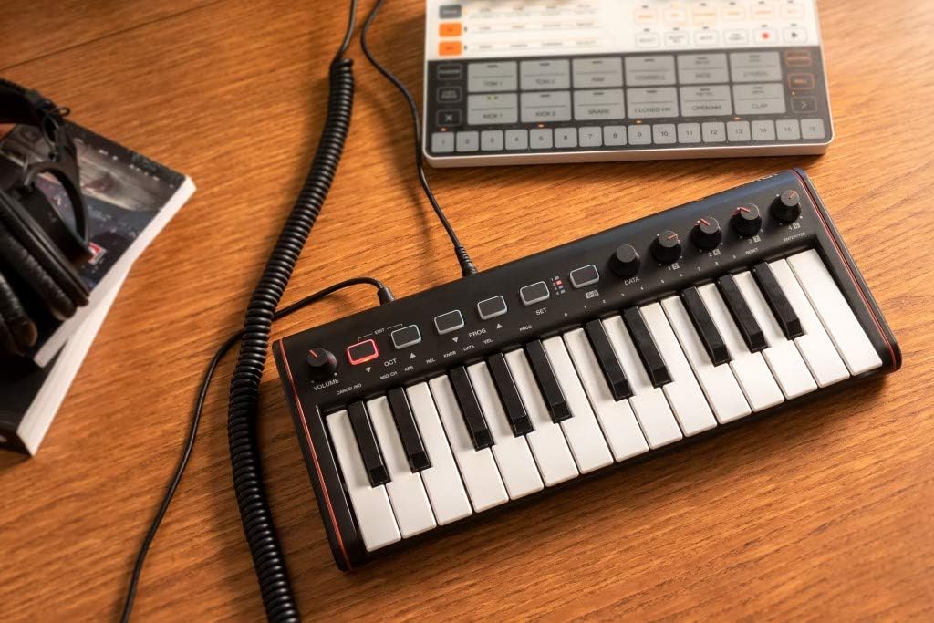 IK Multimedia iRig Keys 2 Mini portable keyboard MIDI controller with 25 velocity-sensitive synth-action mini keys and headphone output, for iPhone, iPad, Mac, PC, Android
