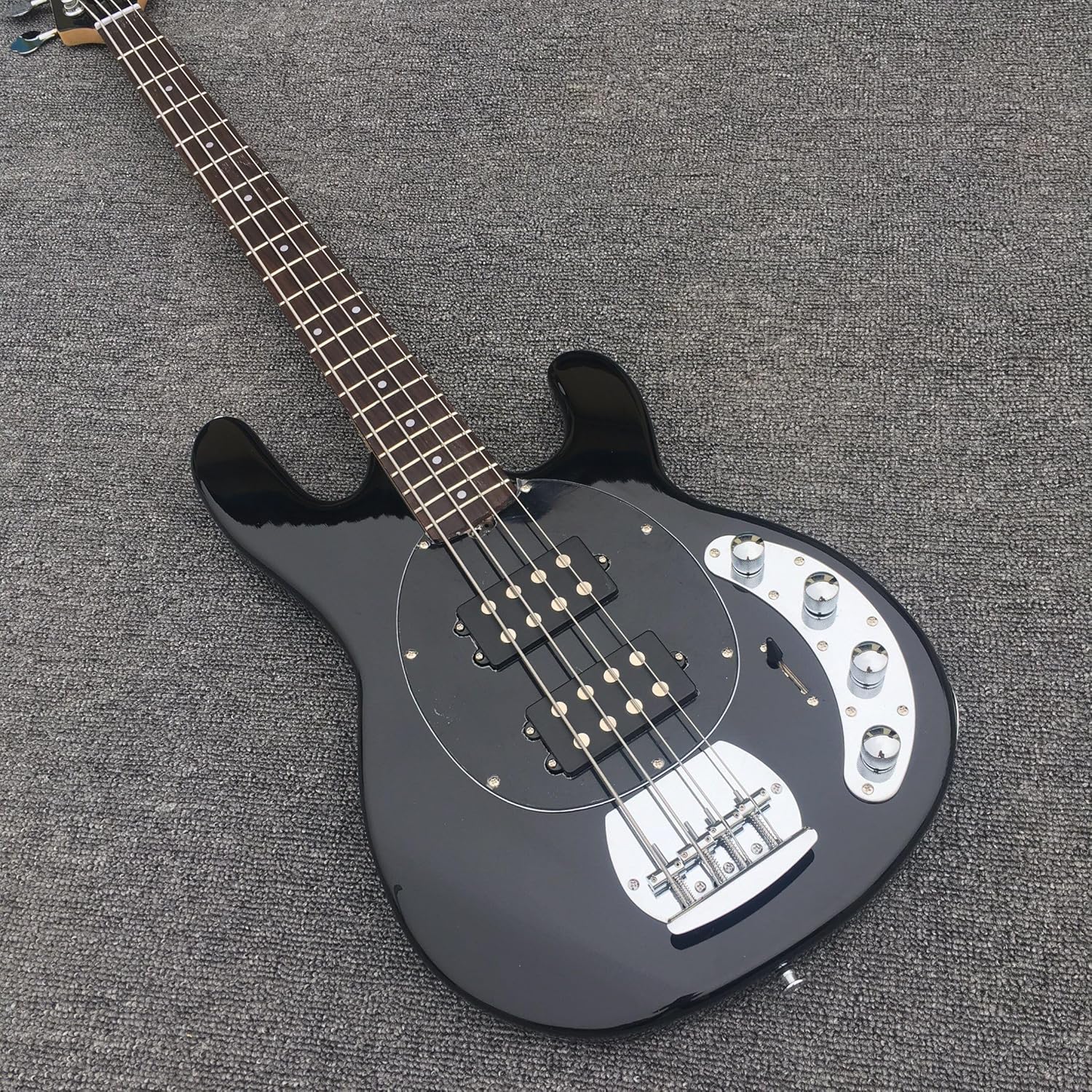Custom Four-Wire Black Electric Bass with Enlarged Line - Perfect for Bassists Seeking a and High- Instrument for Personalized Performance