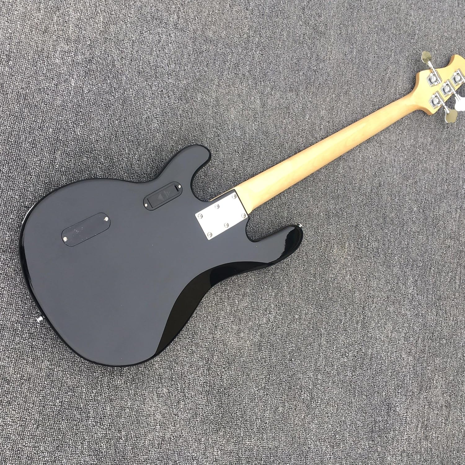 Custom Four-Wire Black Electric Bass with Enlarged Line - Perfect for Bassists Seeking a and High- Instrument for Personalized Performance