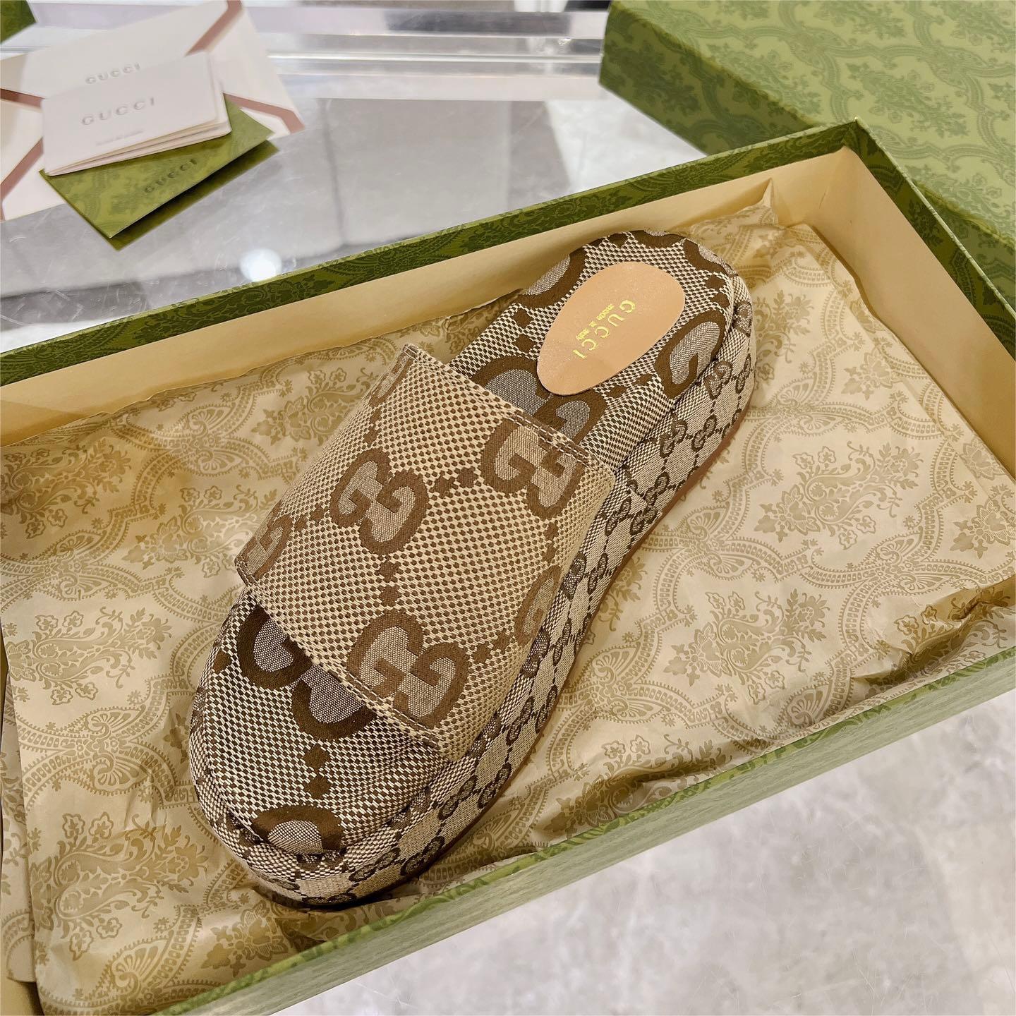 Gucci-thick soled classic embroidered canvas slippers