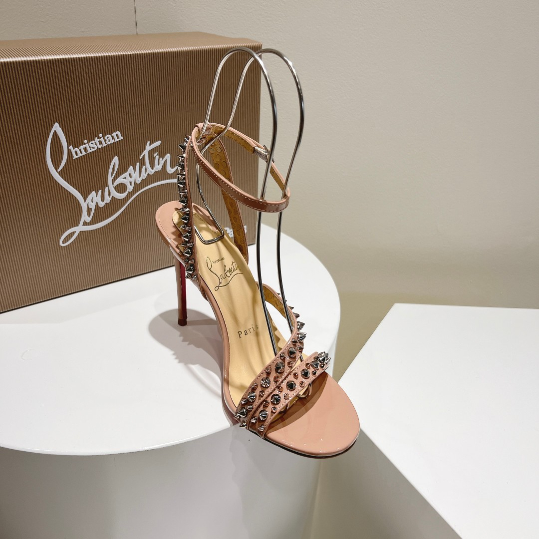 Christian Louboutin-Bare pink high-heeled sandals with diagonal rivets