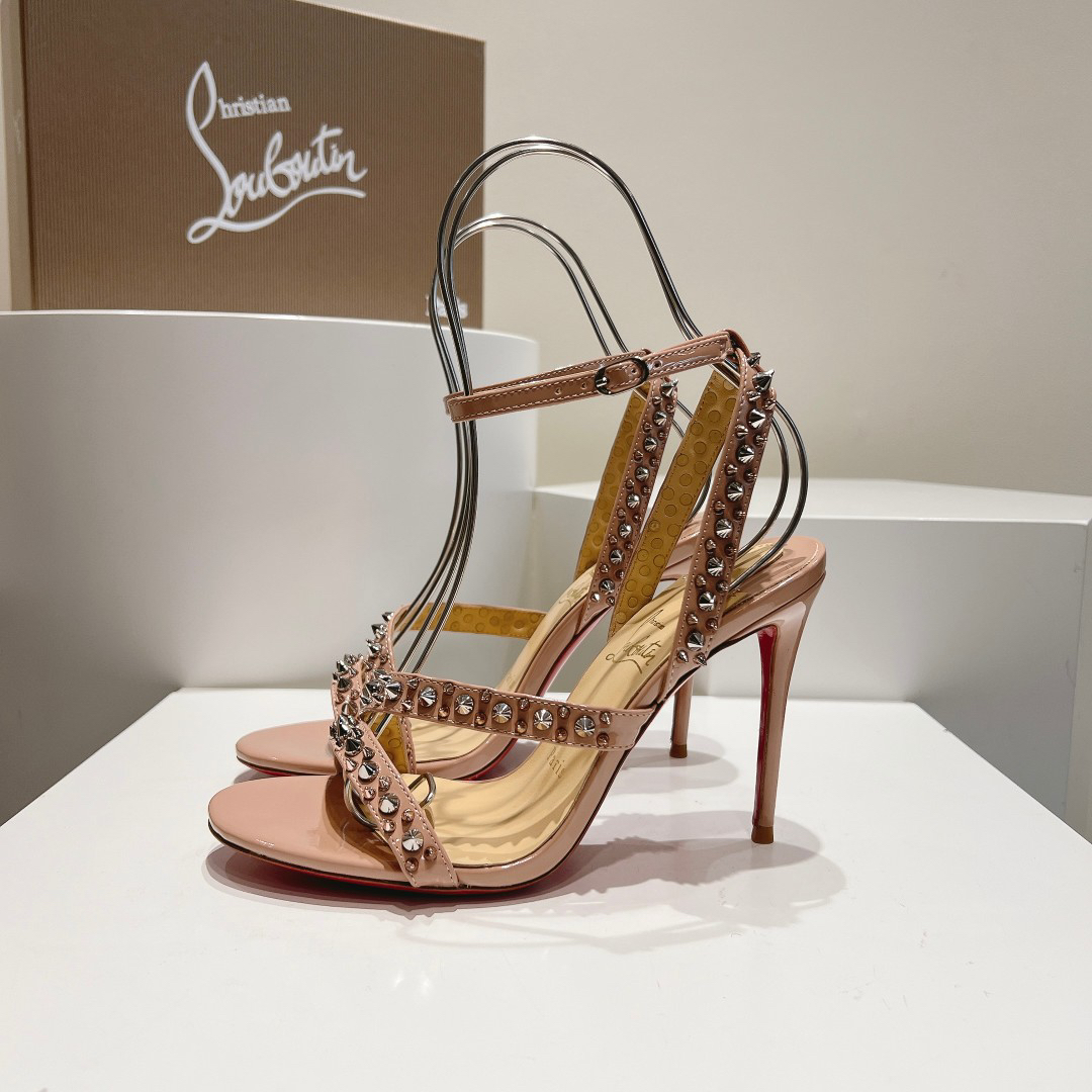 Christian Louboutin-Bare pink high-heeled sandals with diagonal rivets