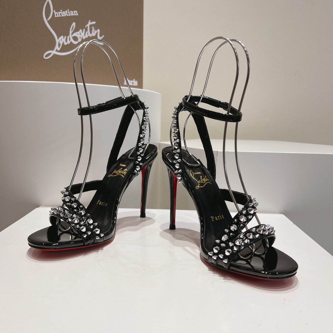 Christian Louboutin-Black high-heeled sandals with diagonal rivets