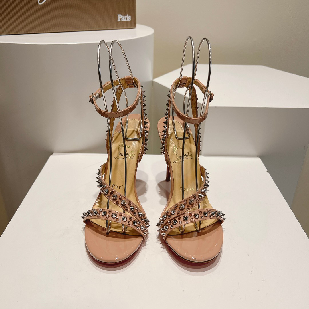 Christian Louboutin-Bare pink high-heeled sandals with diagonal rivets