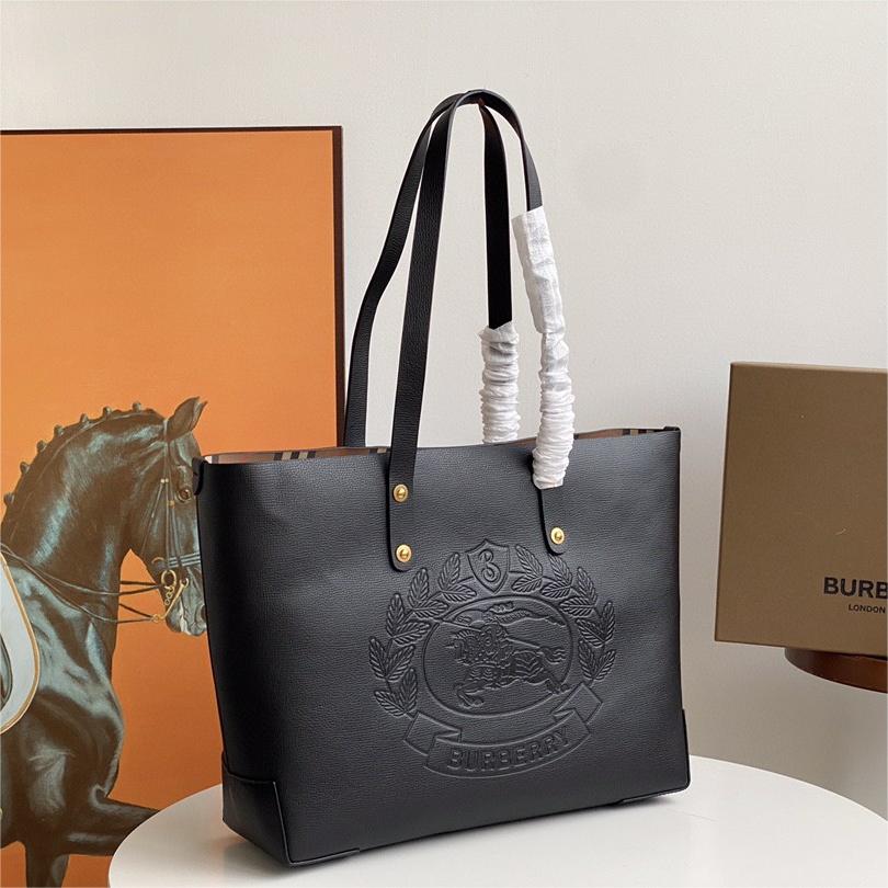 Burberry-Embossed badge leather tote bag