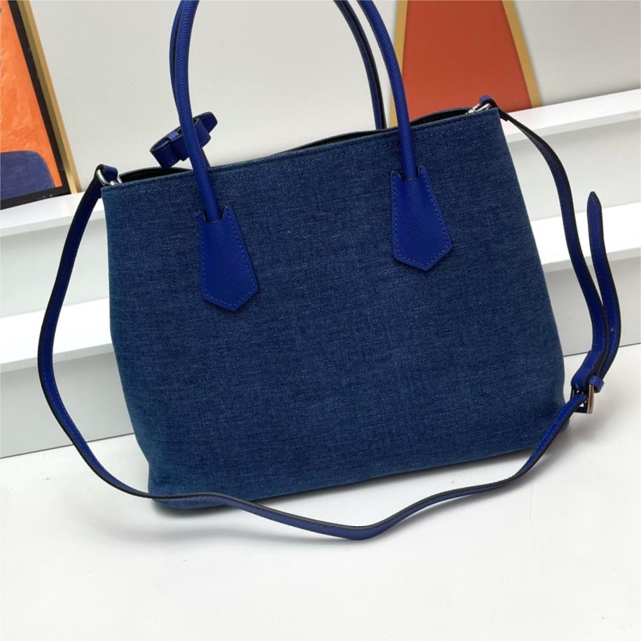 Prada-Cowboy top layer cross pattern cowhide used bag