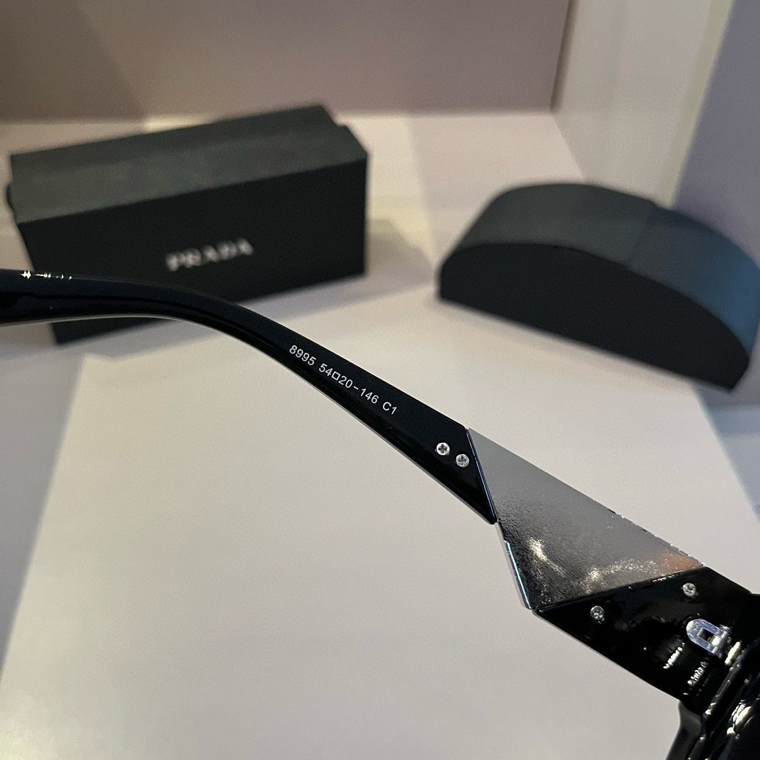 Prada-unisex generous framed sunglasses