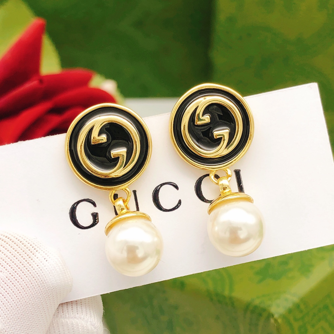 GUCCI- Black base oil hanging pearl earrings