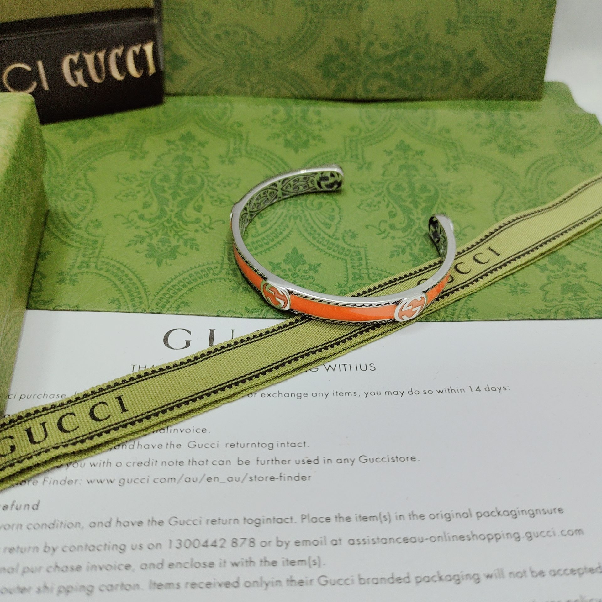 GUCCI-Orange enamel and woven rolled edge bracelet