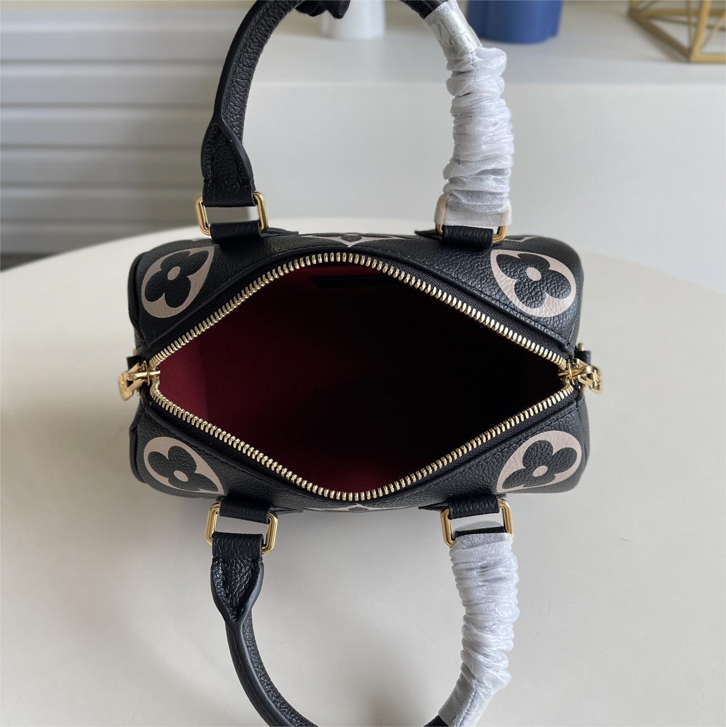 LV-Monogram Empreinte embossed leather bag