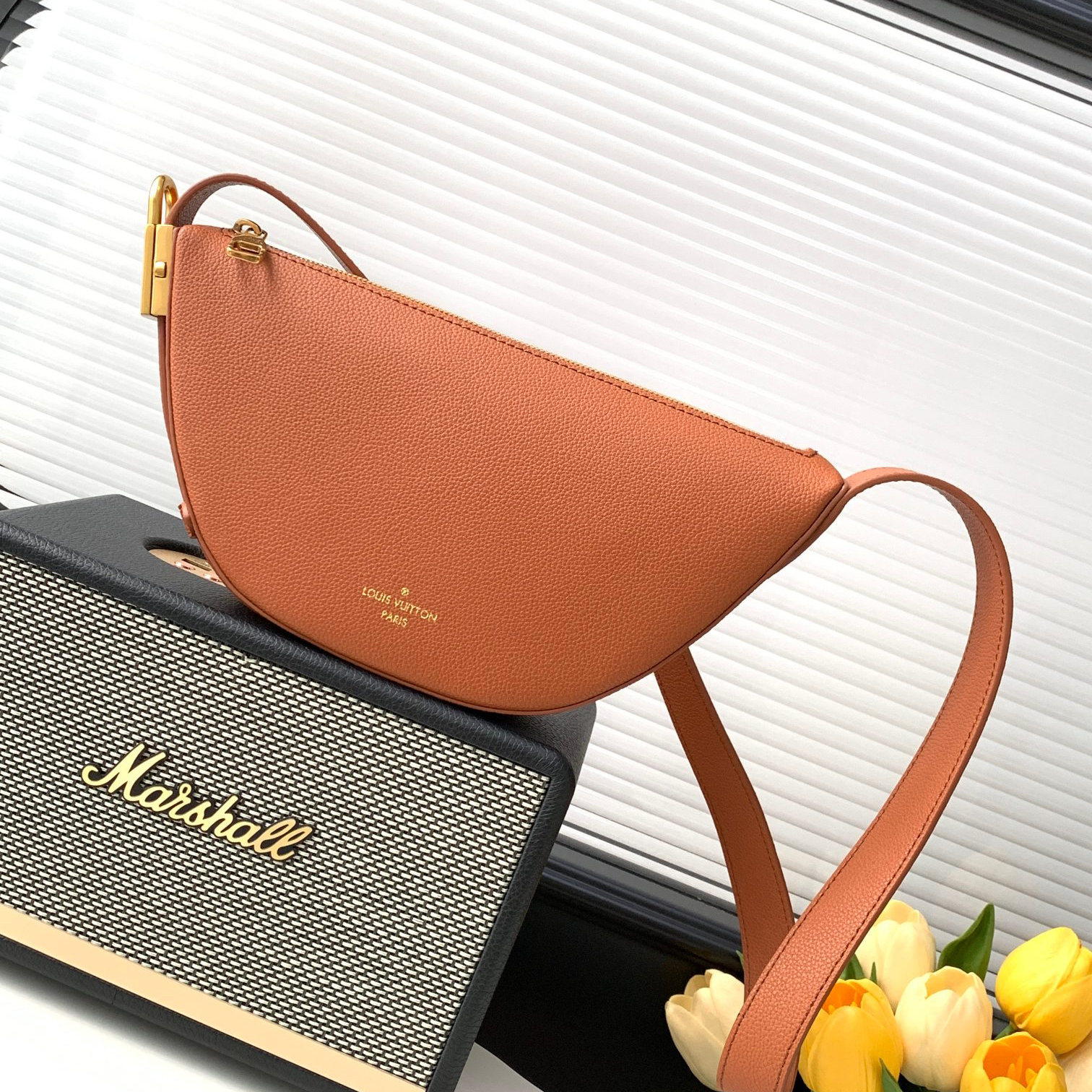 LV- low key leather bag