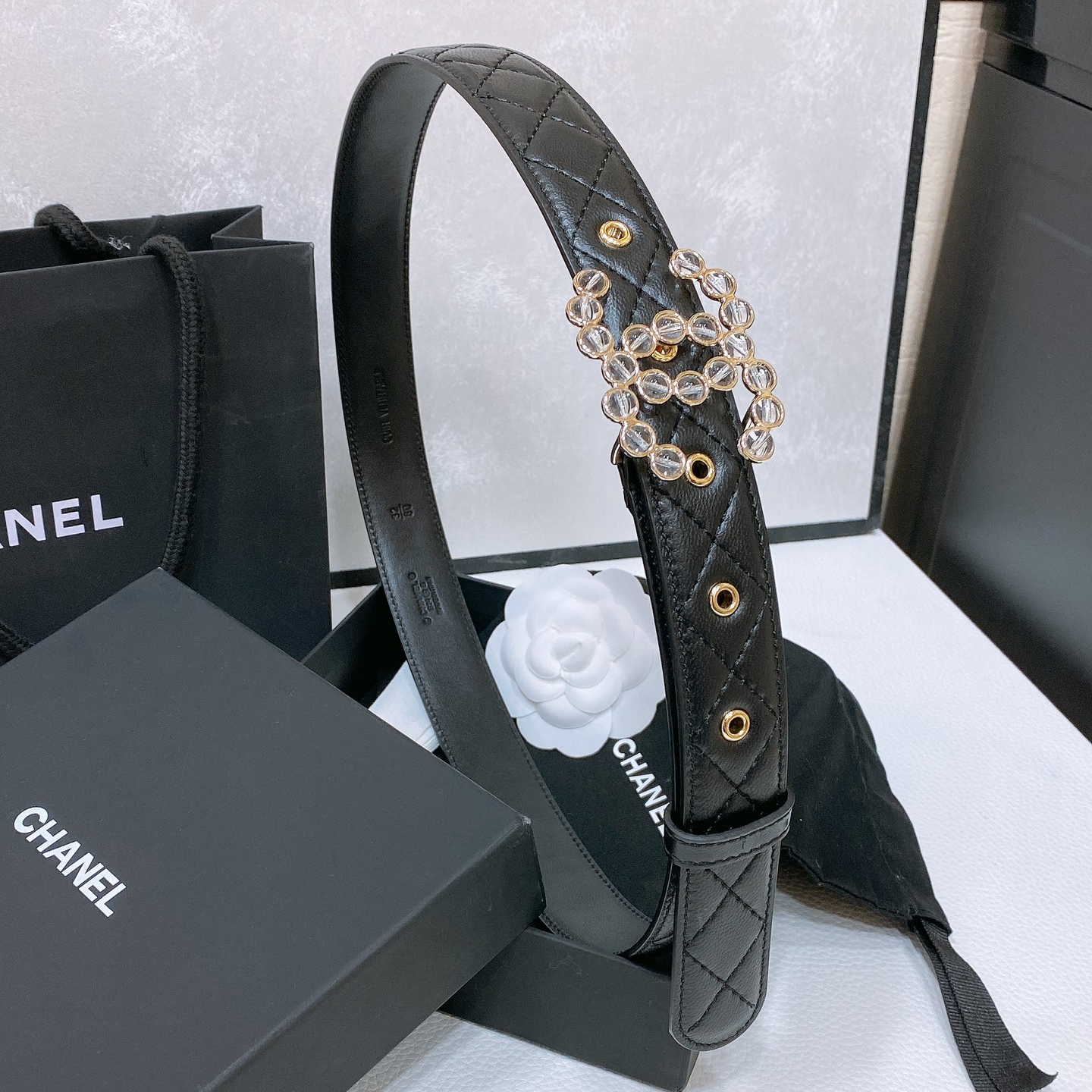 Chanel-Flat leather belt with cowhide pattern