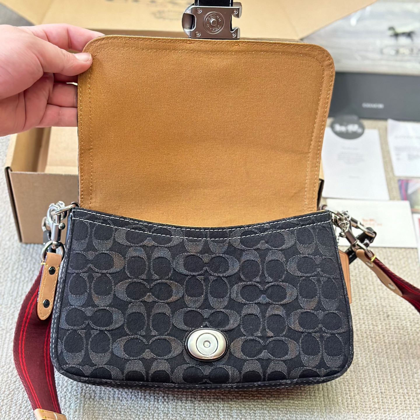 Coach-Embossed denim denim bag